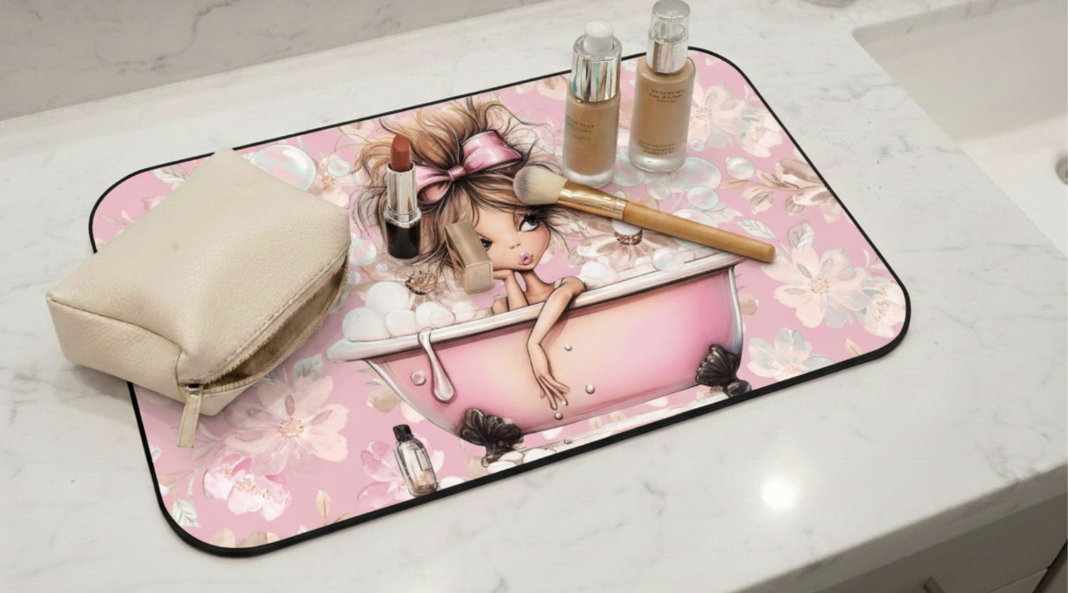Pink floral makeup mat designed to protect vanity and bathroom countertops from makeup spills and messes